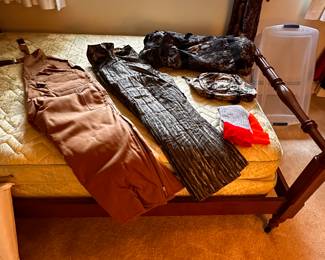 The bed is a full size canopy bed COMPLETE! On the ned, are some very nice mens overalls and more! 