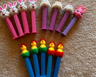 A large assortment of Vintage PEZ Dispensers! Here are 13 that are Easter Themed!