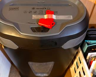 This is a neat mint STAPLES full size paper shredder! 