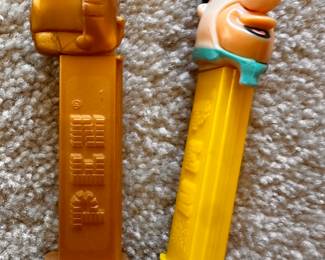 A large assortment of Vintage PEZ Dispensers! Here are 2 that are Character Themed! C3PO and Fred Flintstone! 
