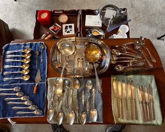 A table filled with vintage and antique silver! Plate AND STERLING! 