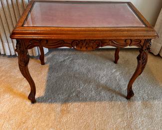 A sweet little side table with glass top! 