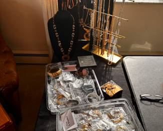 There is a LOT of jewelry! Sterling, Costume, Vintage to New! This is just about 20% of it! Also some very cool vintage post cards, and sheet music! 