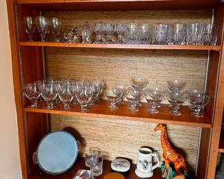 A wall full of beautiful glassware and collectibles! 
