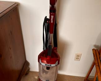 A very nice SHARK Upright Vacuum w/ attachments!