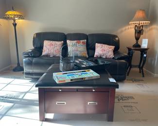 Stone Top Accent Table, Lifestyle Solutions ottoman coffee table, Detroit Monopoly, Accent pillows
Timberland reclining leather couch, Tiffany Style Floor Lamp
