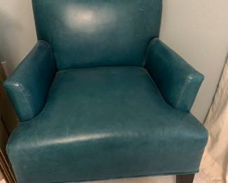 Teal leather chair.