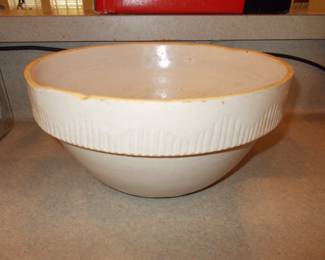 Slightly cracked crock bowl