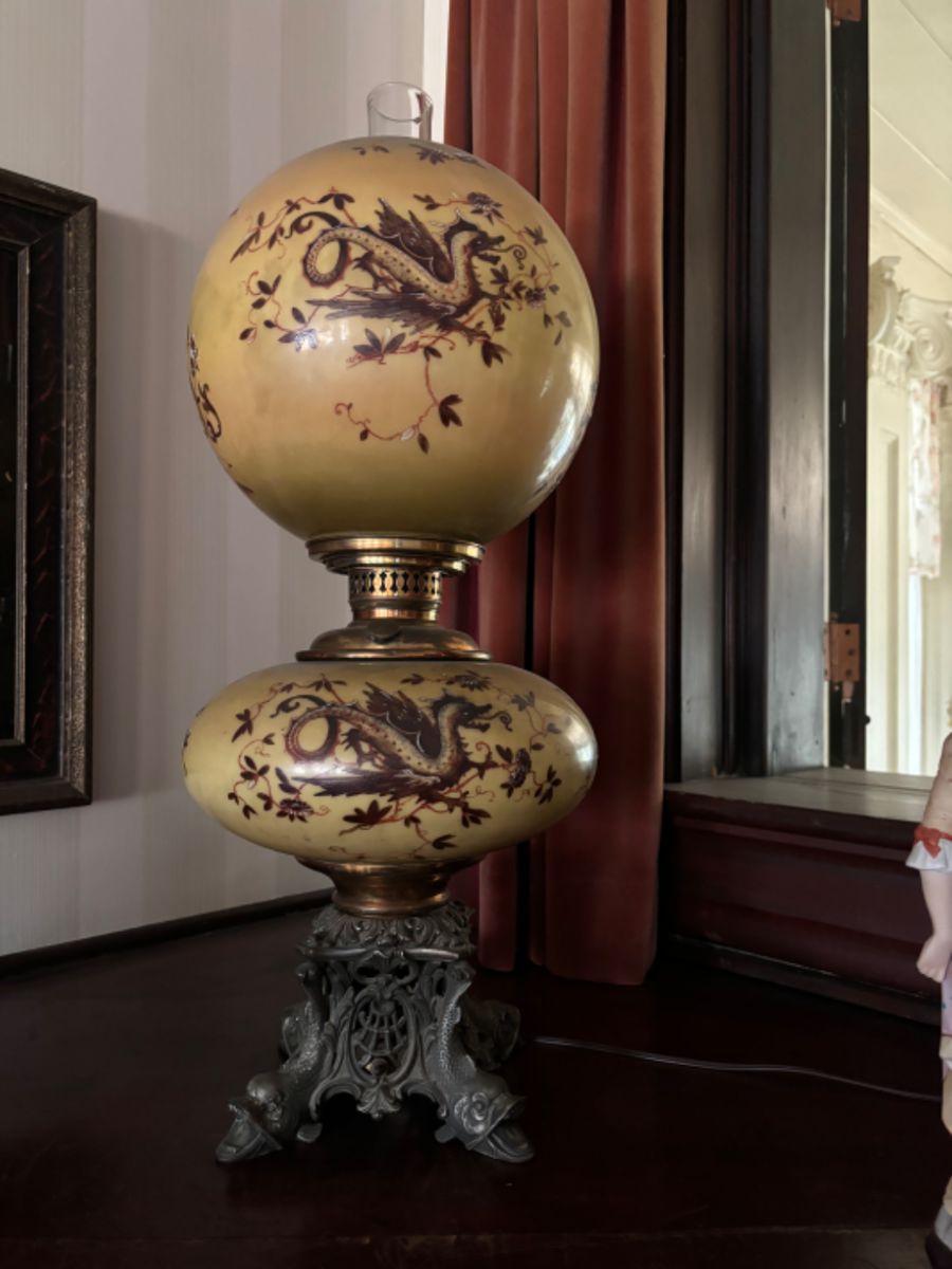 Beautiful converted Gone With the Wind lamp with dragon design and serpent feet dated 1897