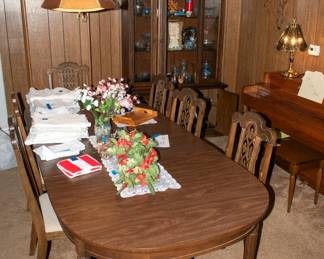Nice table and chairs, china hutch. -Piano not for sale.