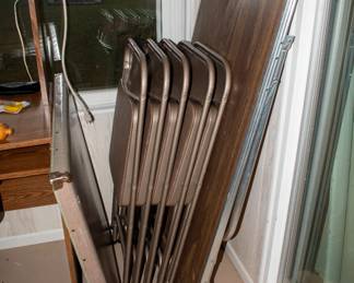 Folding tables and chairs.