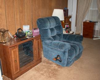 Stereo cabinet, nice recliner chair.