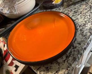 Orange and black enamel plates. Believe these are mid-century from the 60s.