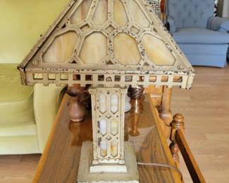 Antique cast iron and slag glass lamp
