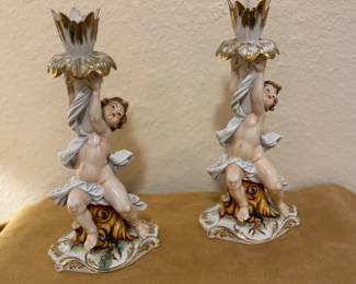 Arnart Rococo-style porcelain cherub candle holders, circa 1950's.