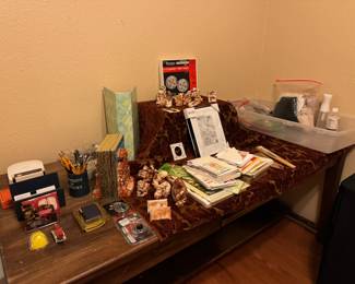 Office supplies and a fantastic custom built (long!) desk with pull out keyboard tray.