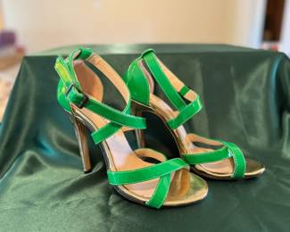 Kelly green strappy sandals with 4 inch gold heels. Barely worn!