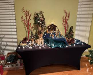 Fun Christmas decor, including 3 foot pre-lit tree and a large nativity set.
