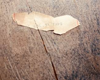 marking under the chair*