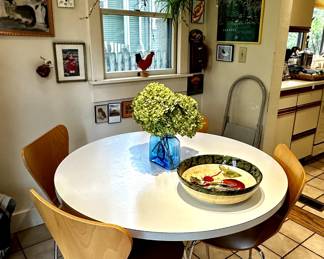 Eat in kitchen table and chairs with a modern flare
