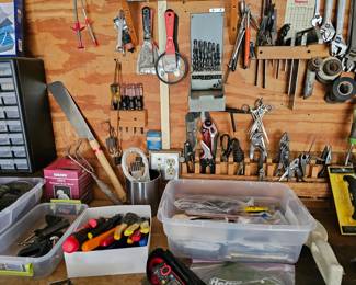 Additional items found on work, bench and wall