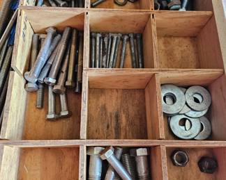 Various bolts within the toolbox