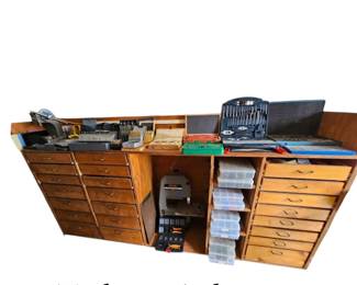 Custom made workbench made using 3/4 " plywood, 22 drawers on ball bearings. SELLING THE ENTIRE WORKBENCH WITH THE CONTENTS INCLUDED. (not what's on top)