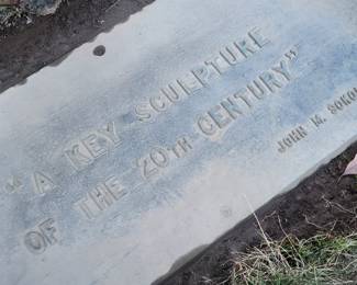 Bronze plaque on the OVERSIZED corporate style sculpture 