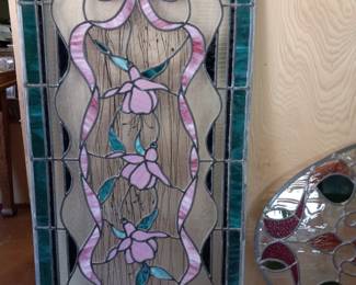 Lots of beautiful stain glass panels and windows.