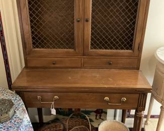 Secretary; some of the many baskets