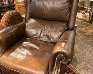 Brown leather recliner with nailhead trim