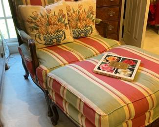 Upholstered chair and ottoman