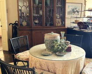Glass top table with custom skirt; four bamboo chairs