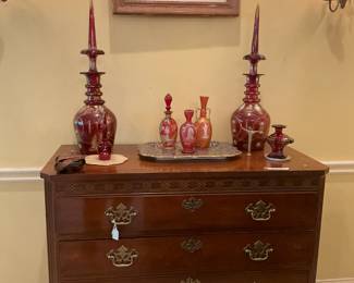 Four-drawer chest; decortive decanters