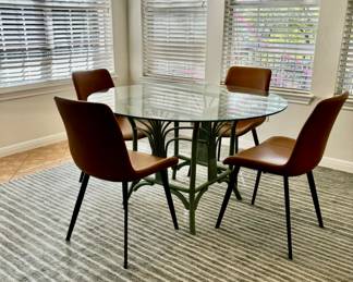 Round glass top dining table, 4 vegan leather chairs