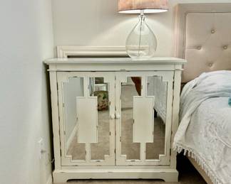 Wood, mirrored cabinet