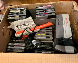 Nintendo with accessories and games 