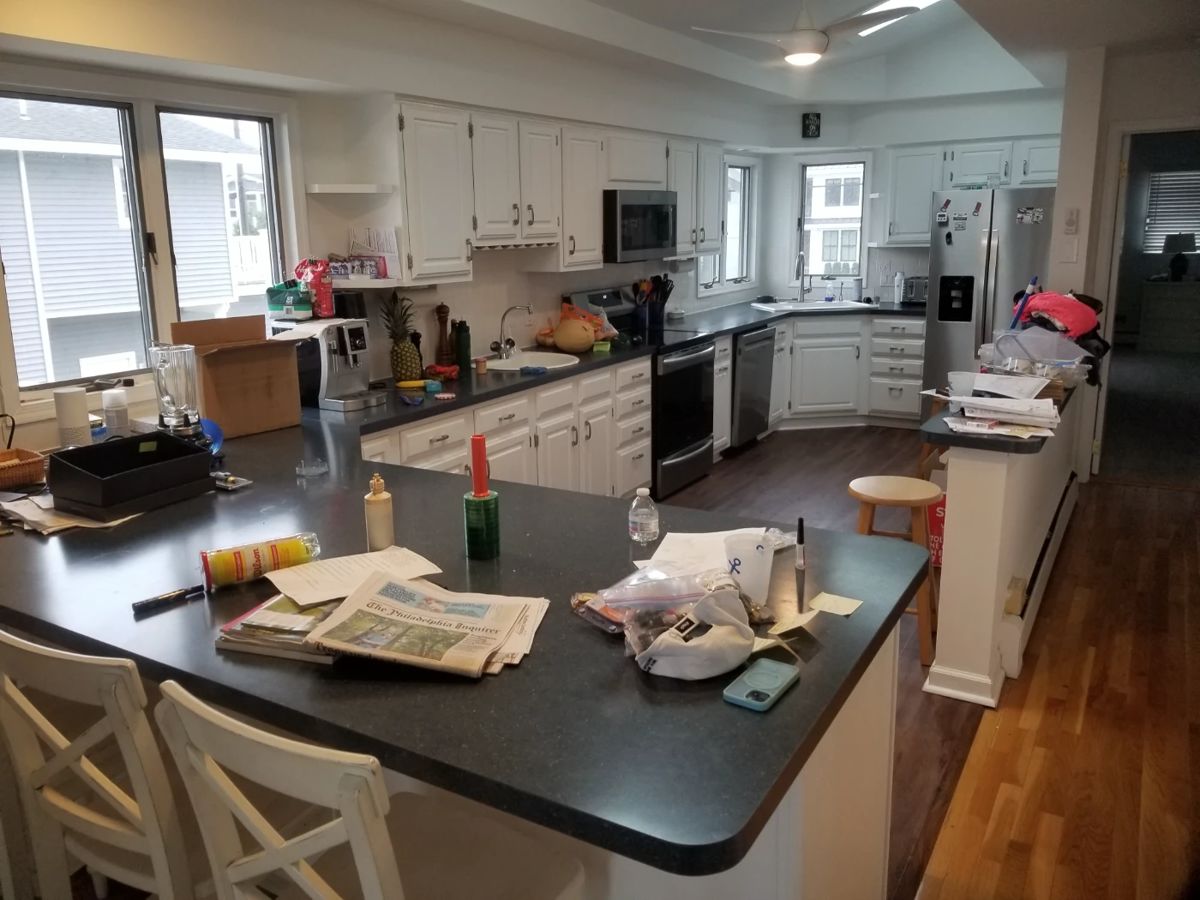 Clean white kitchen with cute cabinets