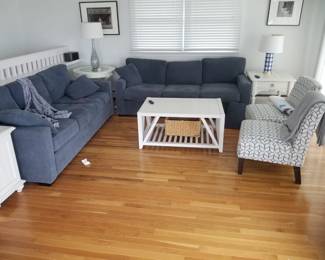 Coastal casual blue couches NOTE: owner keeping coffee table. Two accent chairs