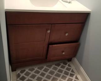 Bath vanity; rug