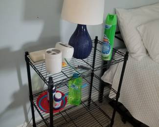 Wire shelving; table lamp