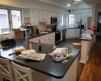 Clean white kitchen with cute cabinets