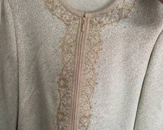 Most St. John jackets have tanks and matching pieces sols as a set