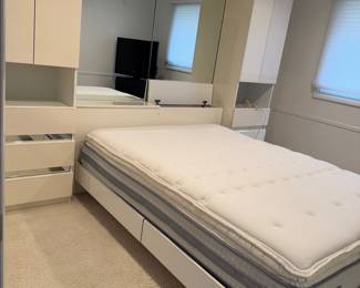 Bed with platform and dresser attached