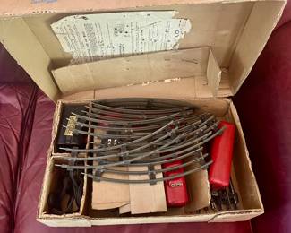 Vintage toy train set includes the tracks. 