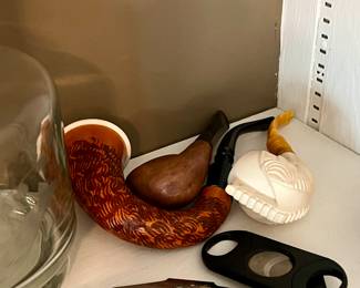 Vintage pipes and cigar cutters