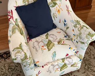 Swivel chair with a unnoticeable bird patterned cover on it (1 of 2)