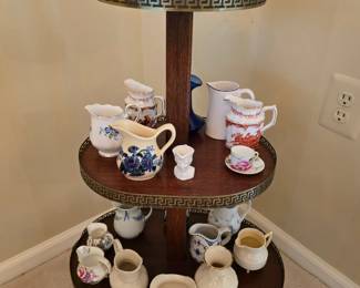 This little delicate with metal accents display tower/shelf would look awesome holding bottle of high end liquor, ice bucket and shaker