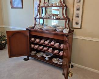 This exquisite server or accent piece makes a statement in any room.