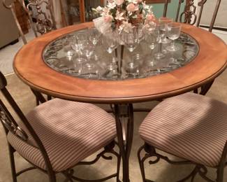 BUY IT NOW $250.00 Beautiful Table and Heavy Metal Chairs. It is in excellent condition. Send message to receive an invoice and schedule pick up prior to November 1st